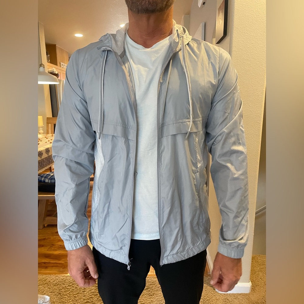 COPY - Men's fitted under armor wind breaker. Zip front